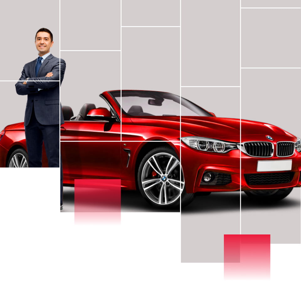 businessman-standing-in-front-of-red-convertible